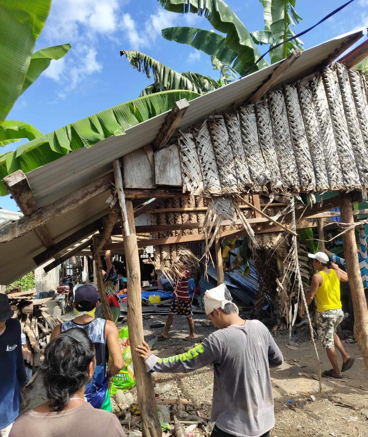 Lola Etang's old house made of wood and woven palm walls